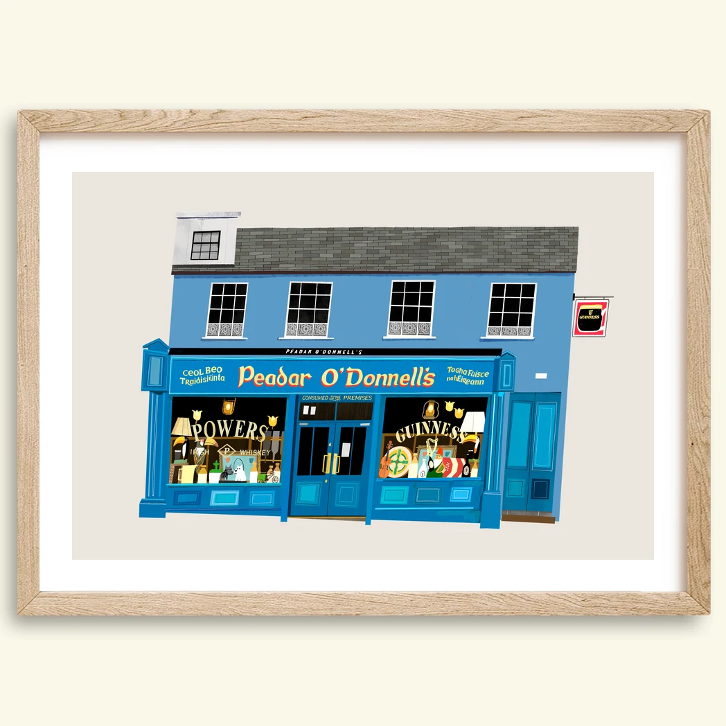 Peadar ODonnells pub print, Waterloo Street Derry, in a brown wood frame by Conor Langton